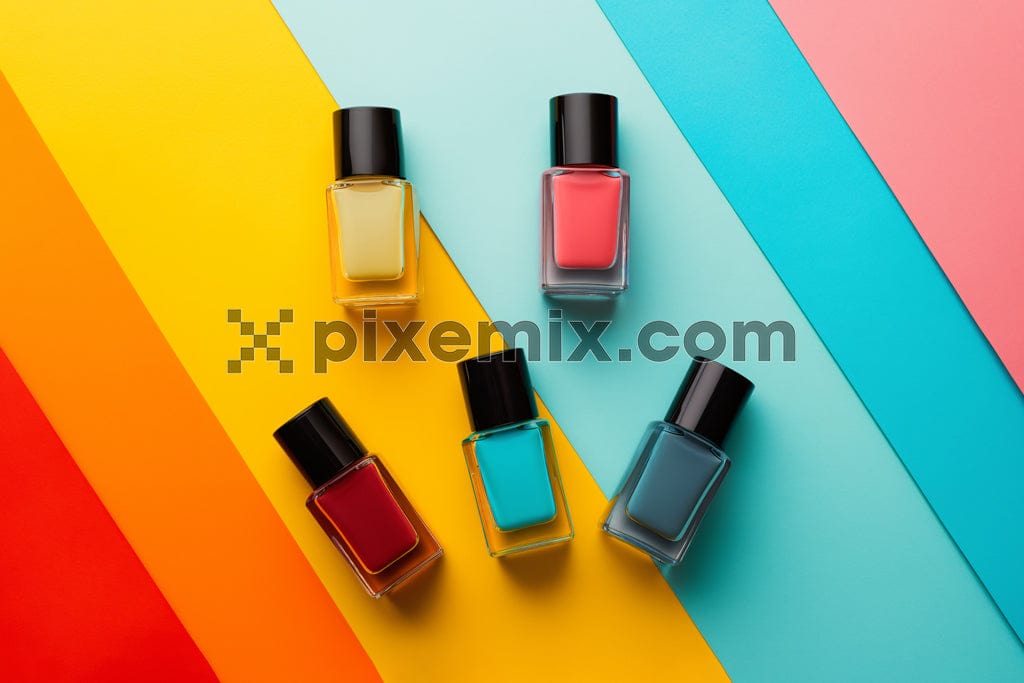 Collection of nail polish on multicolor stripe image.