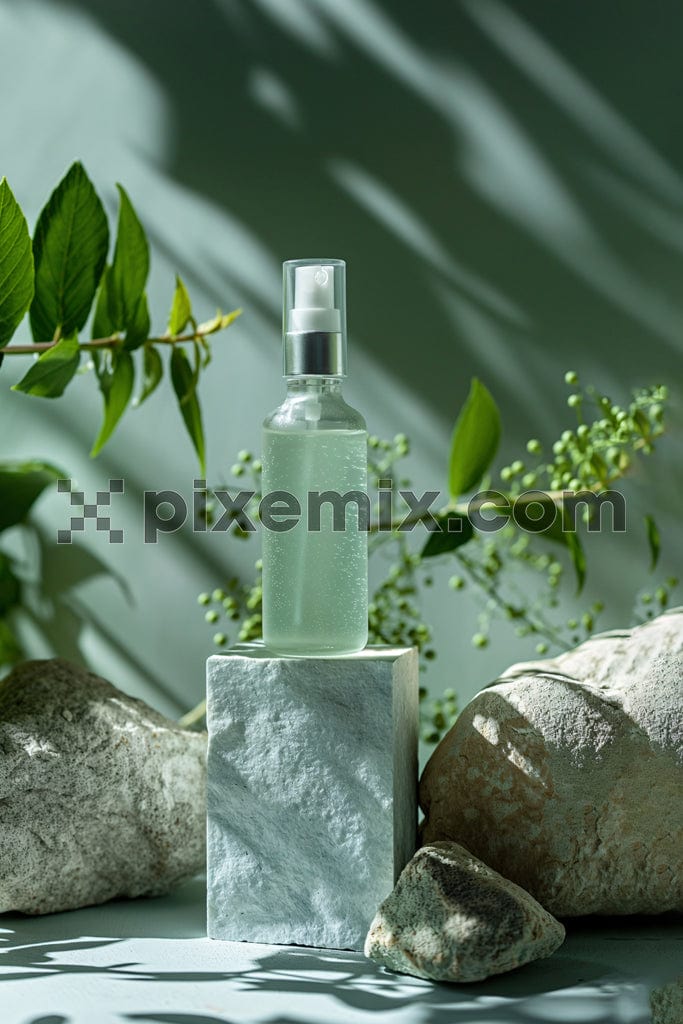 Perfume bottle on stone with tropical background image.