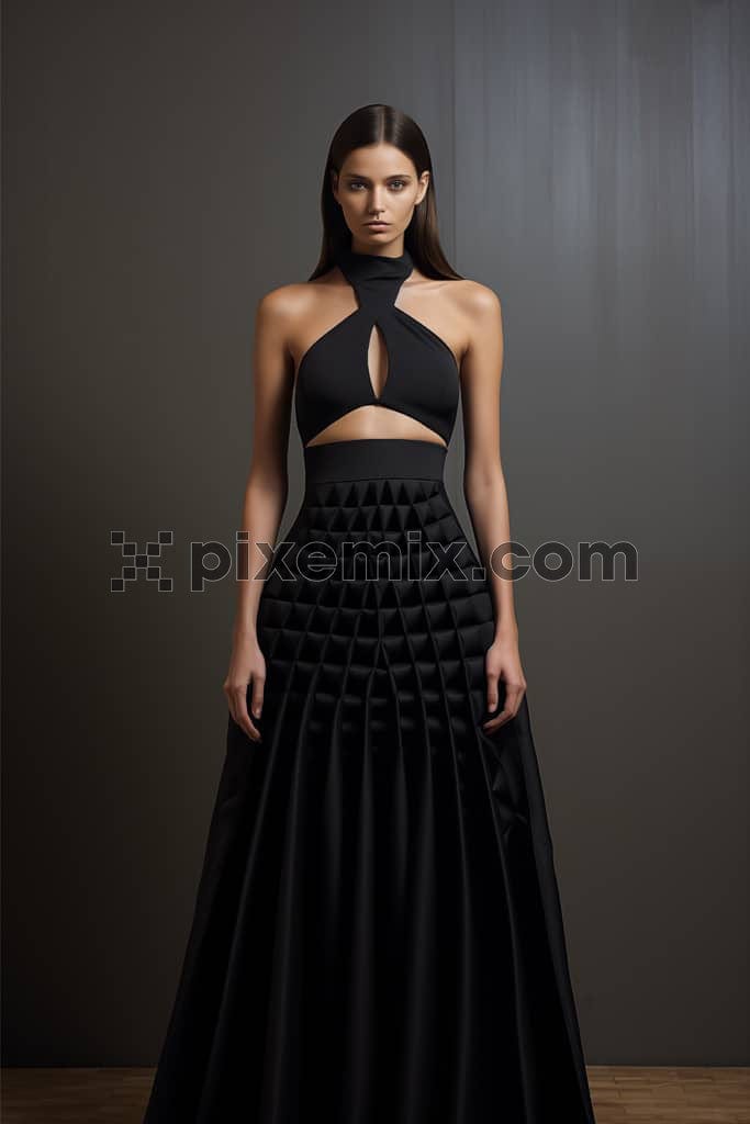 A fashionista with a sleek hairstyle wearing a stylish party wear in black with and creative design fabric manipulation image. 