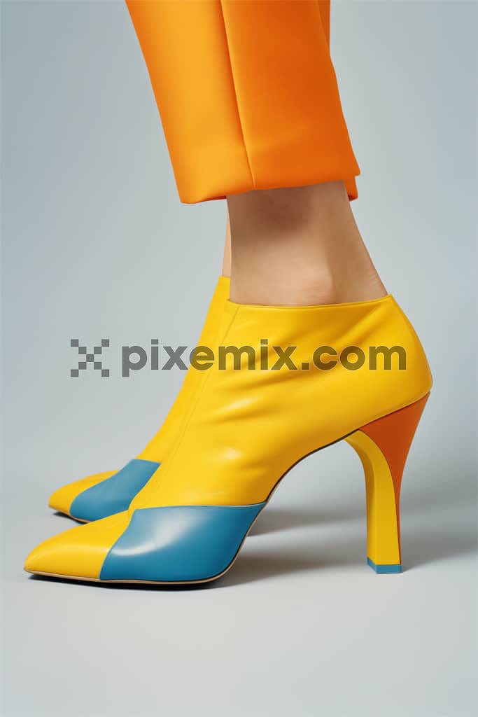 Stylish fashionable heels in pop colour theme styled with orange pants image.