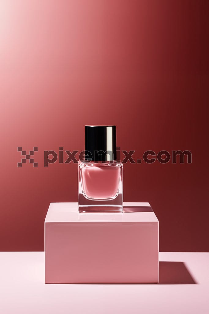 Pink nail polish on geometric podiums with pink background image.