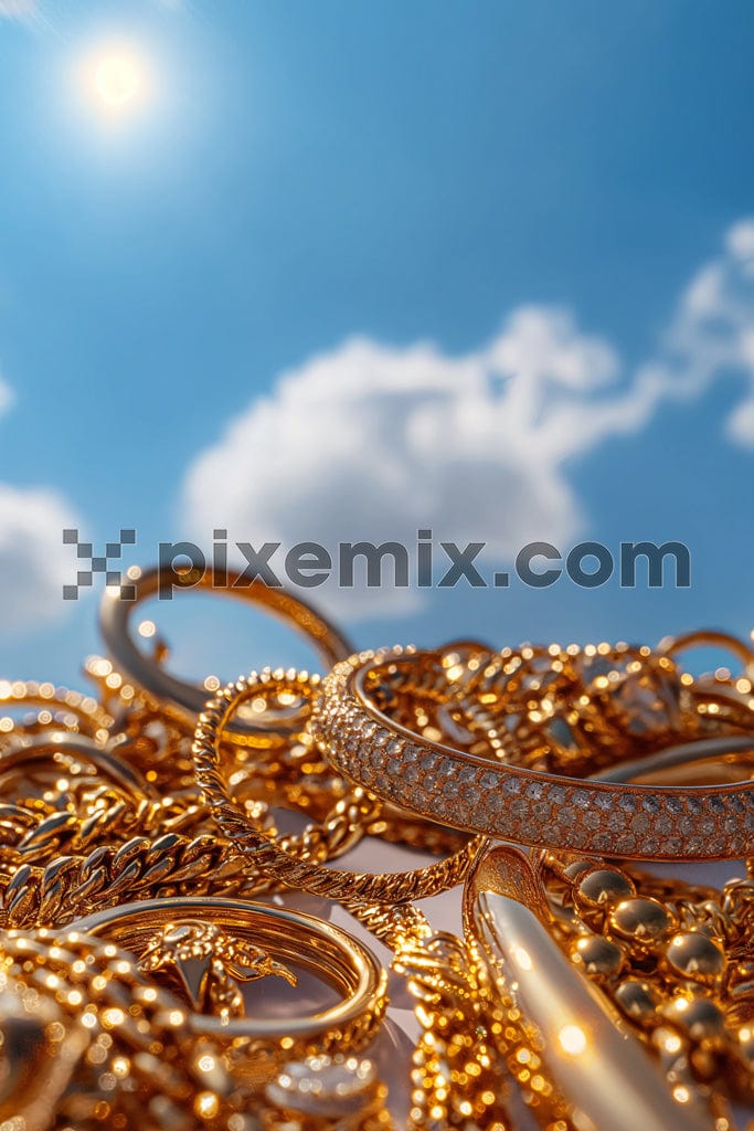 Close up shot of  indian golden wedding jewellery with sky image. 