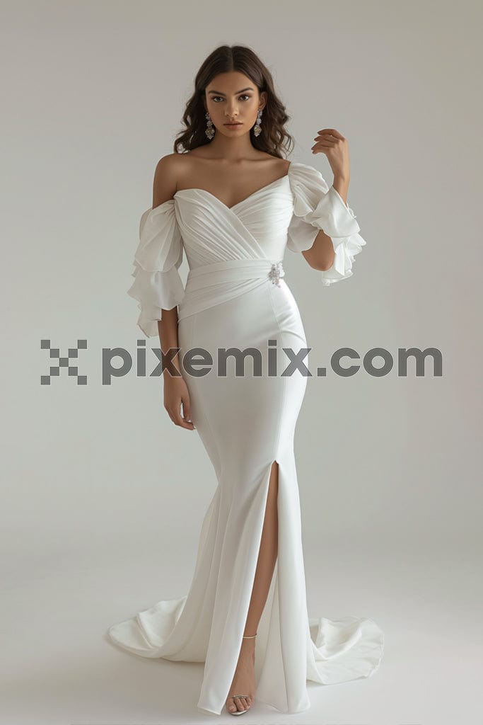 Fashion woman posing in white dress on white background.