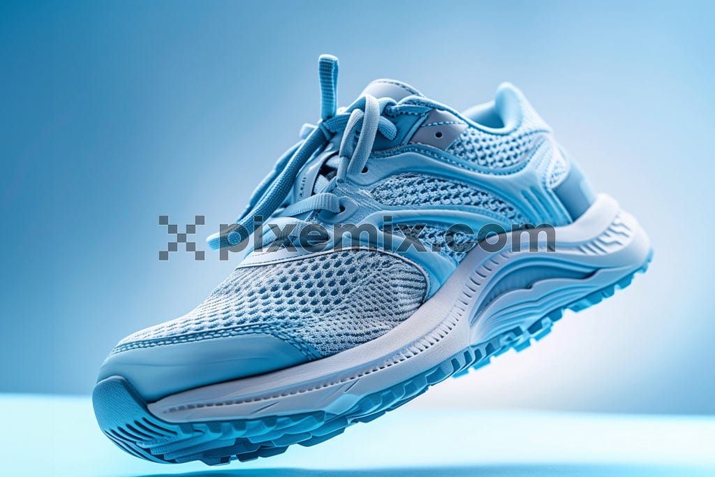 Sport shoe on blue background image.