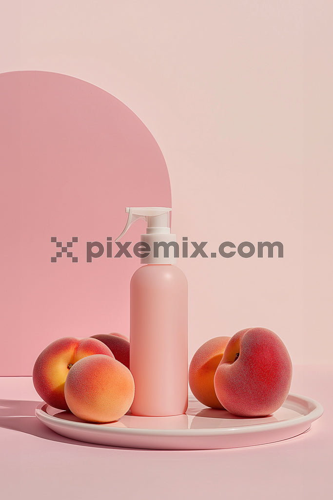 Minimalist peach-themed skincare bottle on tray with peaches in soft pink studio lighting.