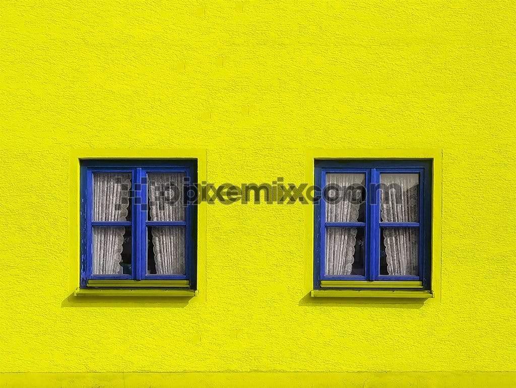 Yellow textured wall with blue curtained windows in symmetry background image