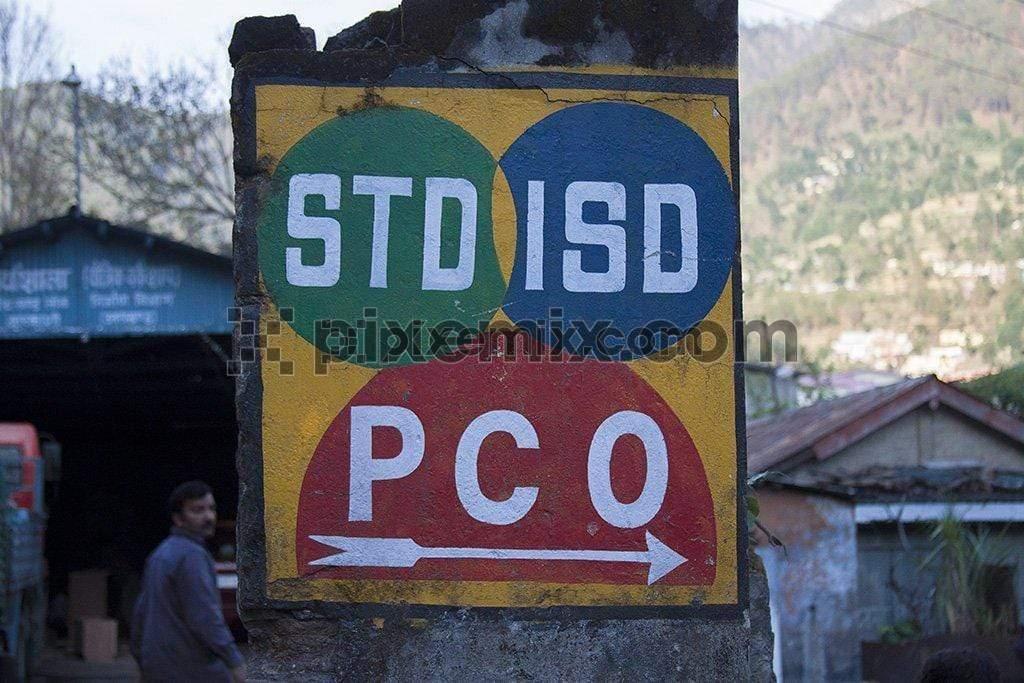 Std isd pco signage in rural India image