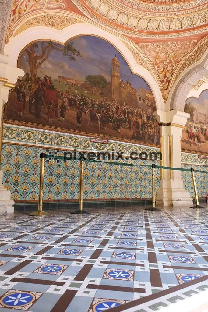 Mughal inspired floorings and walls with huge paintings depicting royal parade at mysore palace