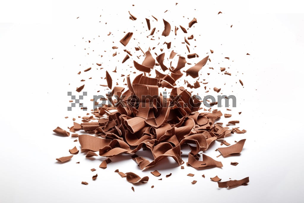A pile of dark chocolate shavings isolated on a white background image.